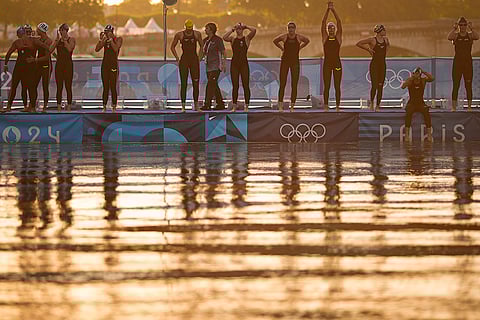 Athletes line up for the start of marathon swimming women's 10km competition